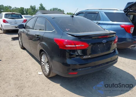 2016 Ford Focus Titanium z USA, uszkodzony, nr VIN 1FADP3J29GL305154